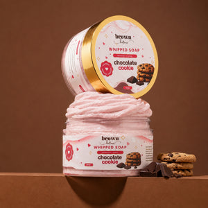 Brown Butters Chocolate Cookie Whipped Soap jar with lid propped open, styled with cookies and dark chocolate