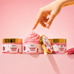 Brown Butters Raspberry Popsicle Dessert Spa Trio on pink, a popsicle stick dipped in the whipped soap.