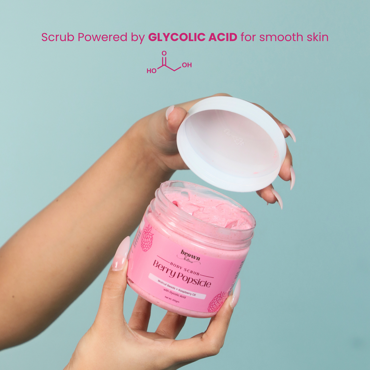 Brown Butters Cookies & Cream Duo scrub callout showing a Berry Popsicle Scrub jar with glycolic acid